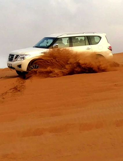 Dubai Jeep Desert Safari with Camel Ride, Quad Biking and Sandboarding
